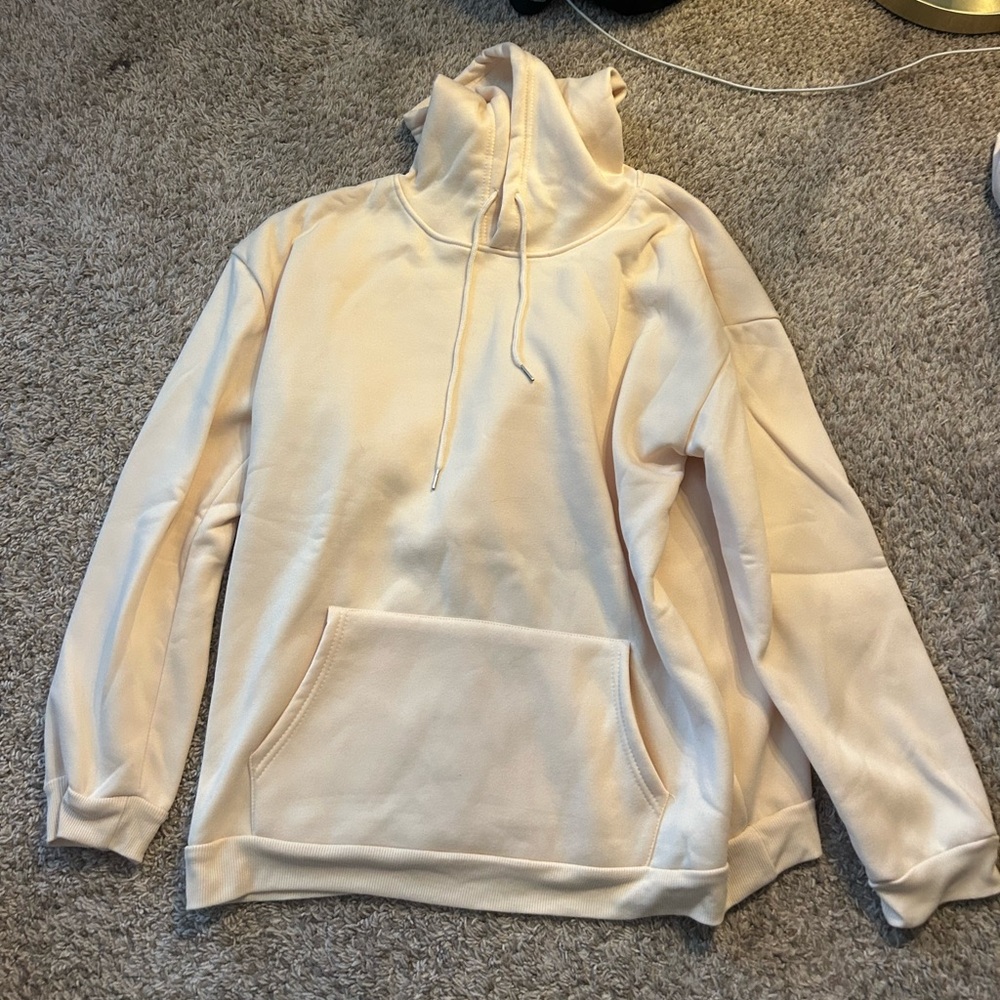 cream/yellow sweatshirt with halloween/fall decor on the back